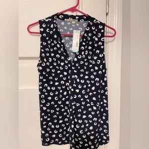 V-neck navy and white print blouse